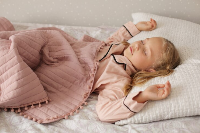 Baby resting on comfortable fabrics